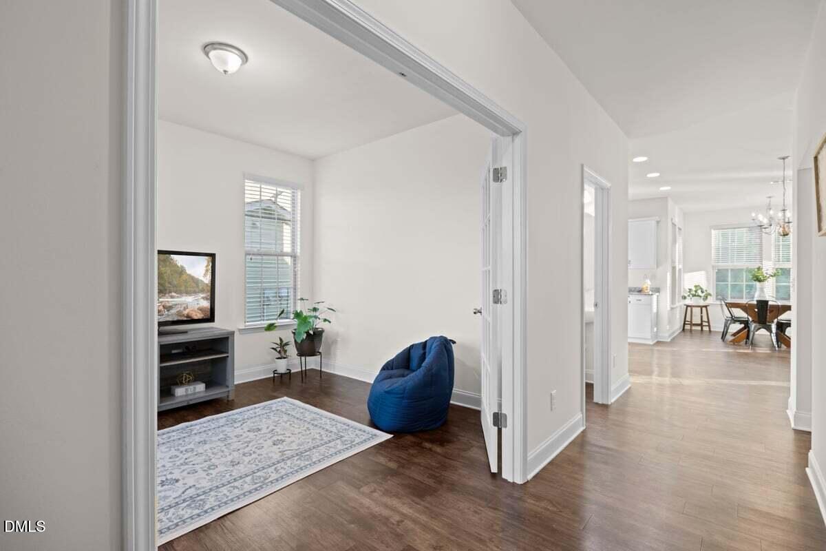 917 Stable Fern Drive Fuquay-Varina, NC 27526 - Photo 4 of 31 a living room with furniture and a table