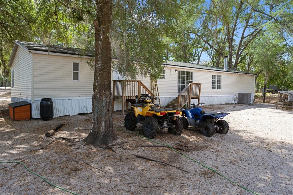 4059 McKethan Road Dade City, FL 33523 - Photo 49 of 50 a view of a house with a patio