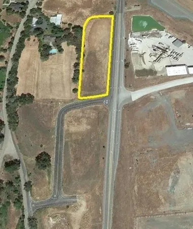 a bathroom with a glass door shower and sink