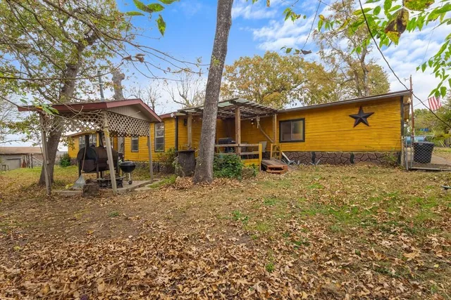 a backyard of a house with lots of green space