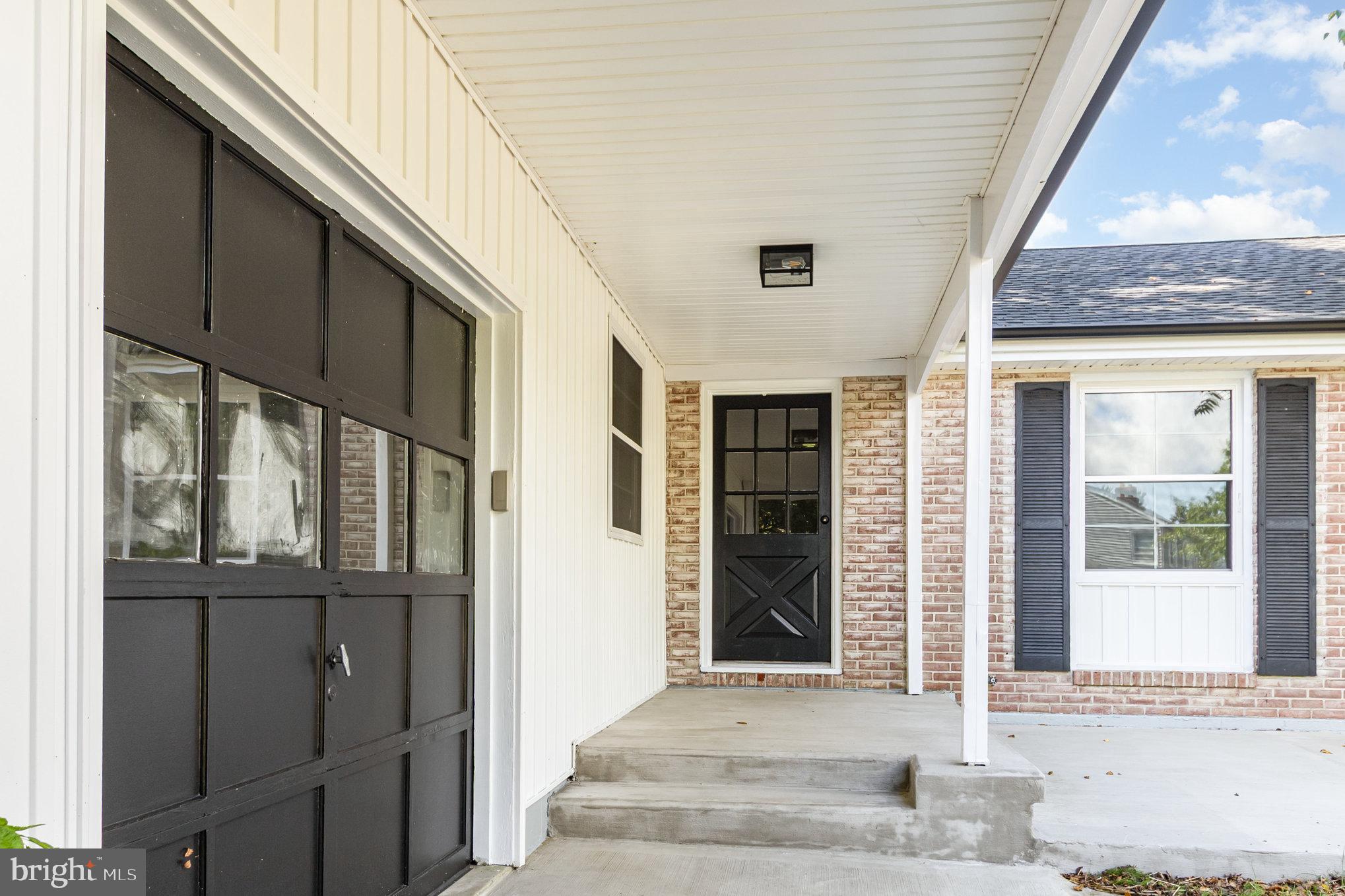 606 Southgate Road Aberdeen, MD 21001 - Photo 5 of 31 Garage and covered front porch with patio