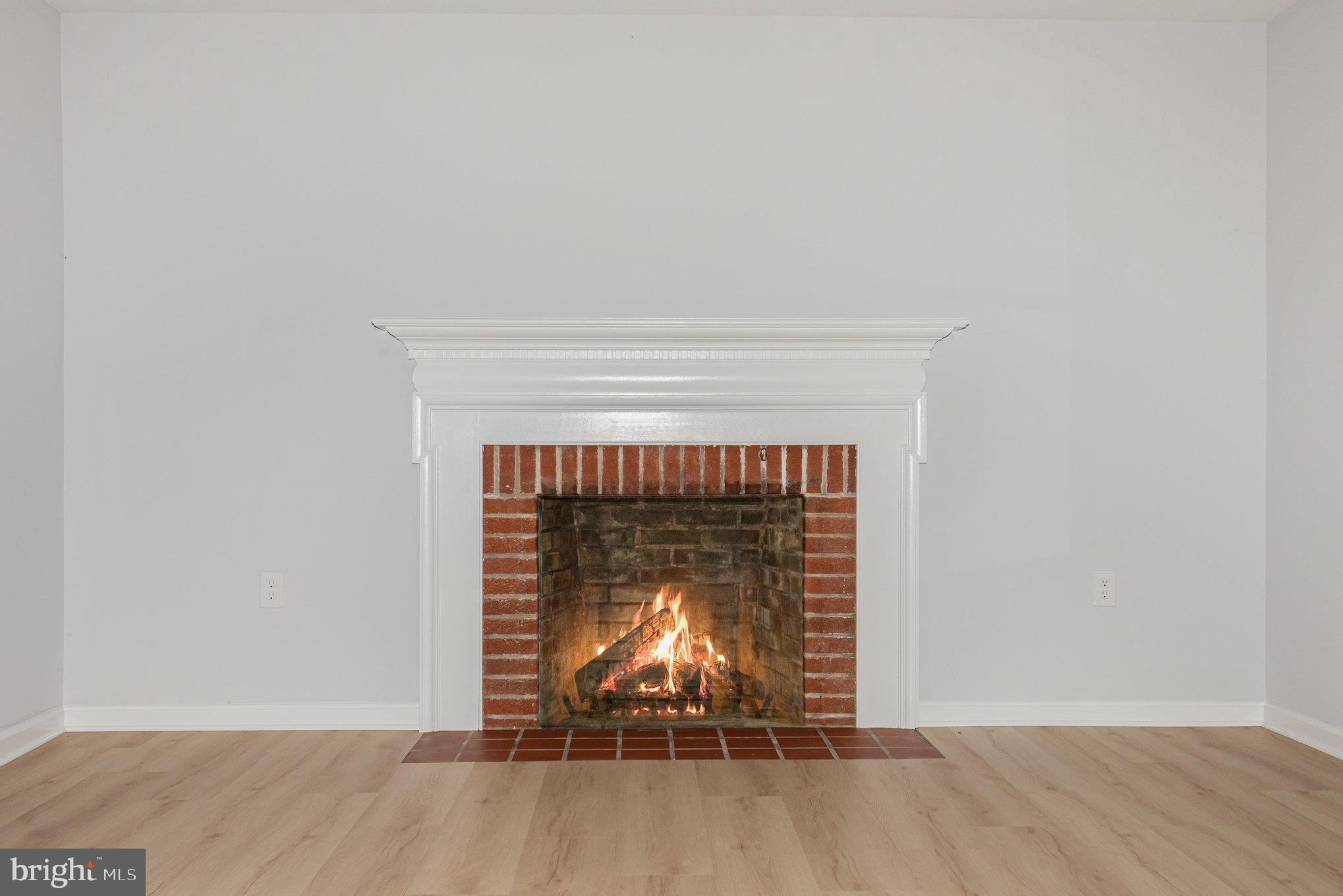 606 Southgate Road Aberdeen, MD 21001 - Photo 10 of 31 Living room with wood fireplace