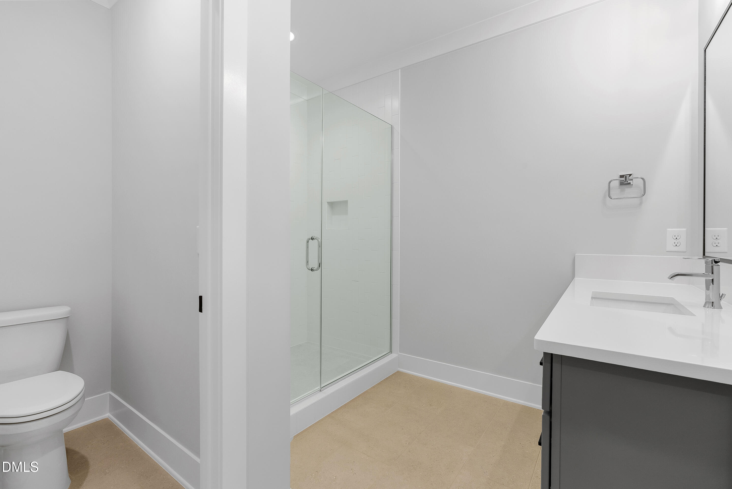 811 Maple Berry Lane, Unit 103 Raleigh, NC 27607 - Photo 33 of 59 a bathroom with a sink toilet and vanity