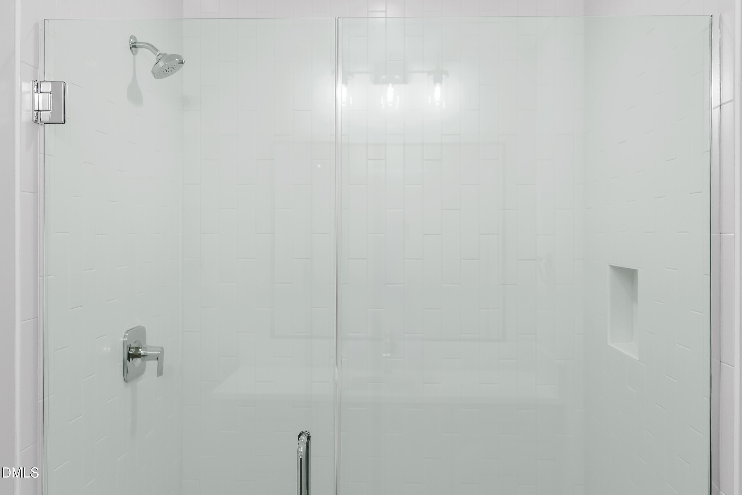 811 Maple Berry Lane, Unit 103 Raleigh, NC 27607 - Photo 35 of 59 a bathroom with a shower