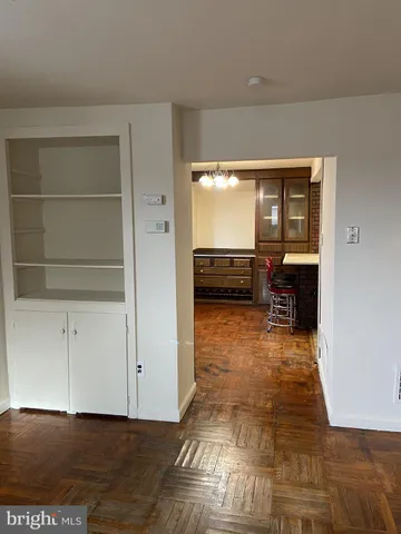 a view of living room with furniture and window
