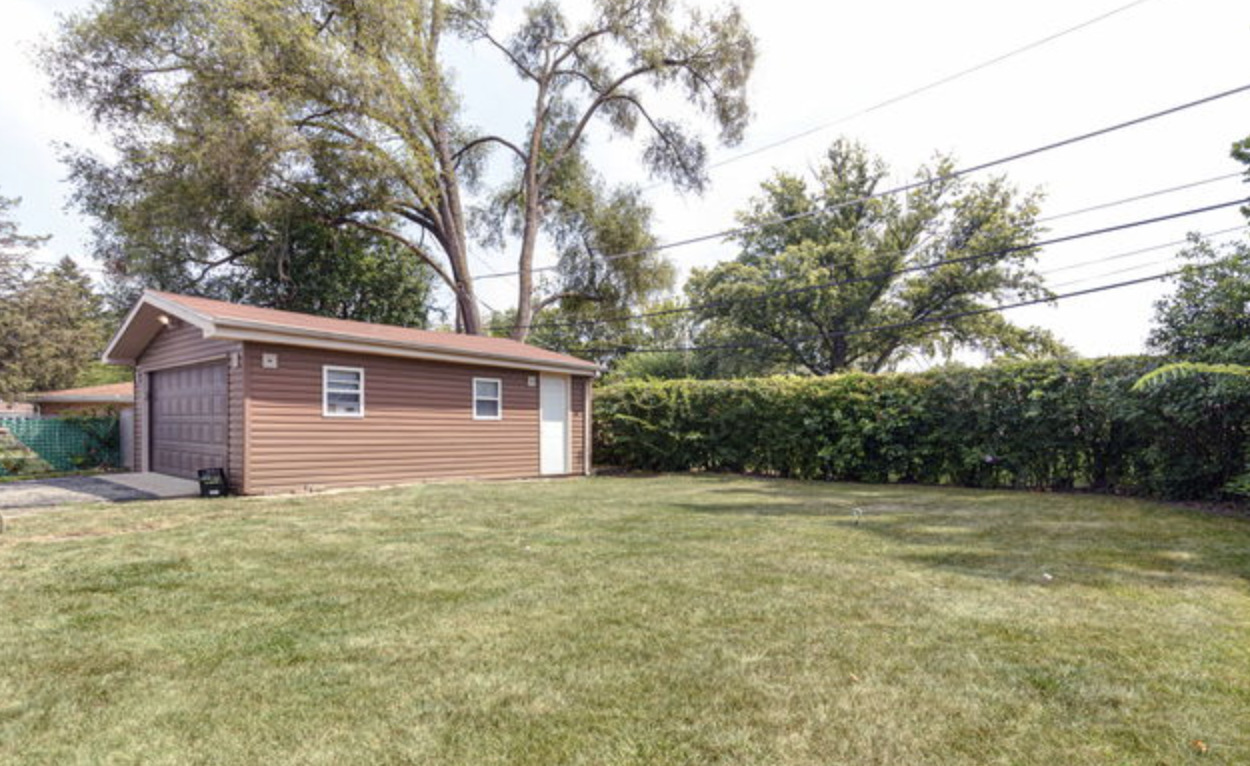 137 Highview Avenue Addison, IL 60101 - Photo 11 of 12 a view of a house with a yard