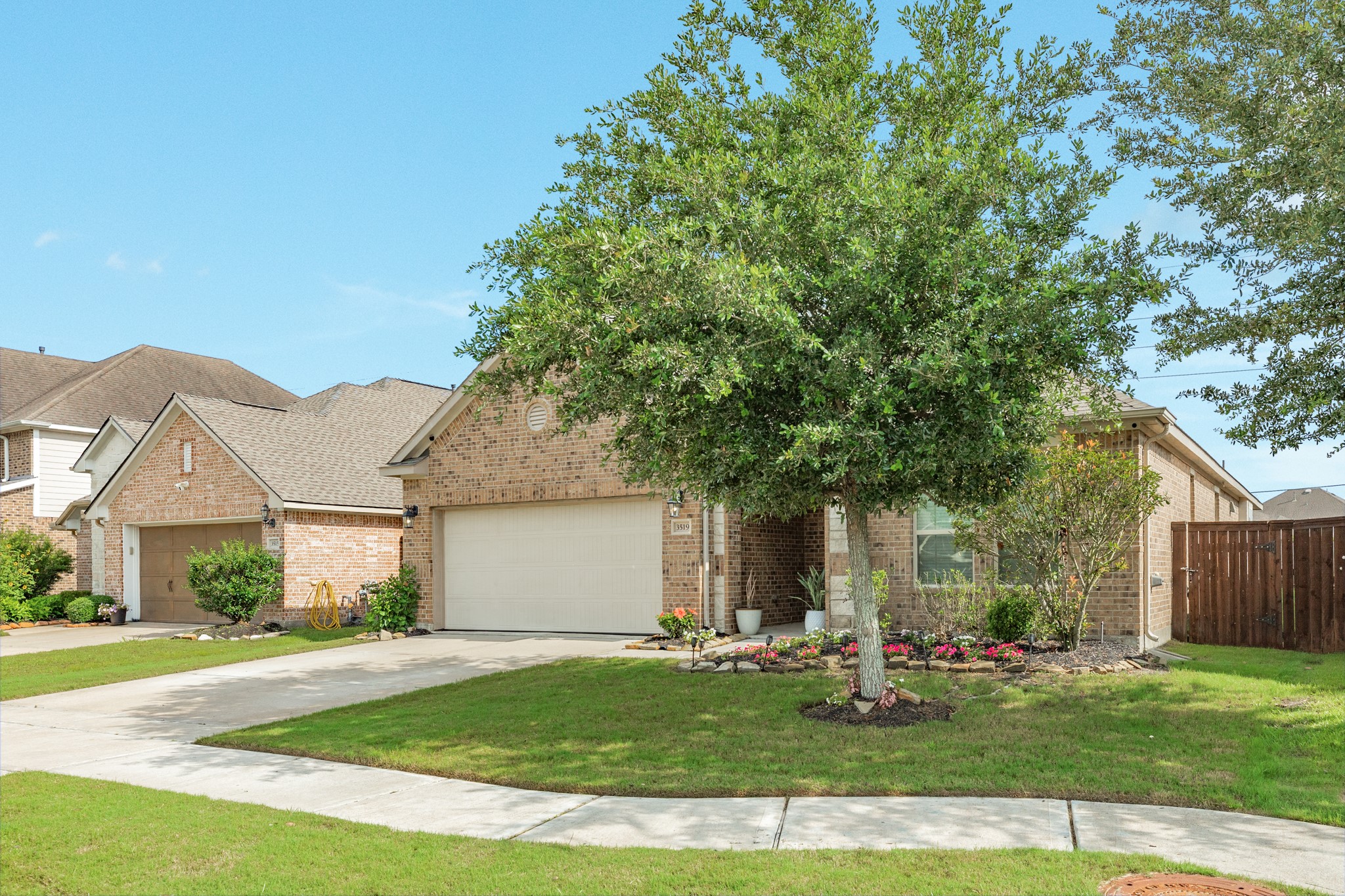 3519 Bay Drive Rosharon, TX 77583 - Photo 29 of 49 Stunning curb appeal featuring meticulously manicured landscaping that highlights the home's exterior charm.