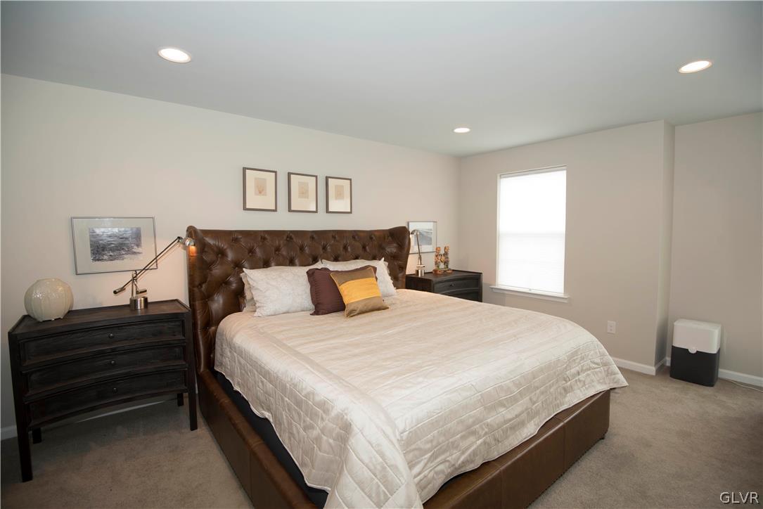 407 Pennycress Road Allentown, PA 18104 - Photo 12 of 34 a bedroom with bed and window