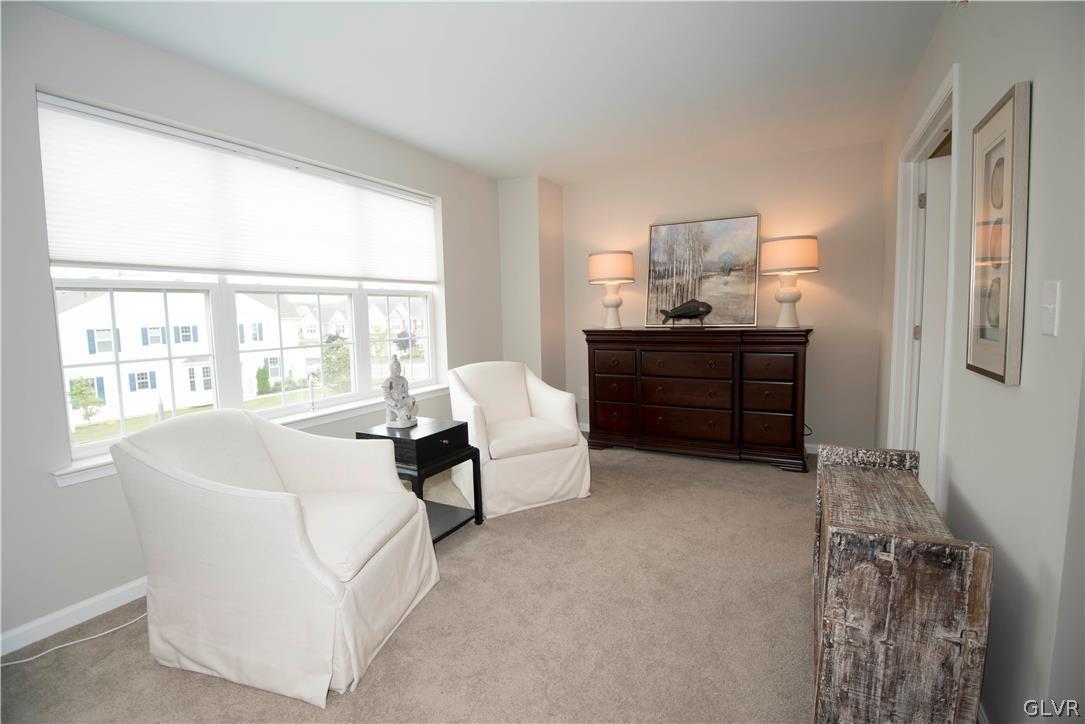 407 Pennycress Road Allentown, PA 18104 - Photo 15 of 34 a living room with furniture and large windows