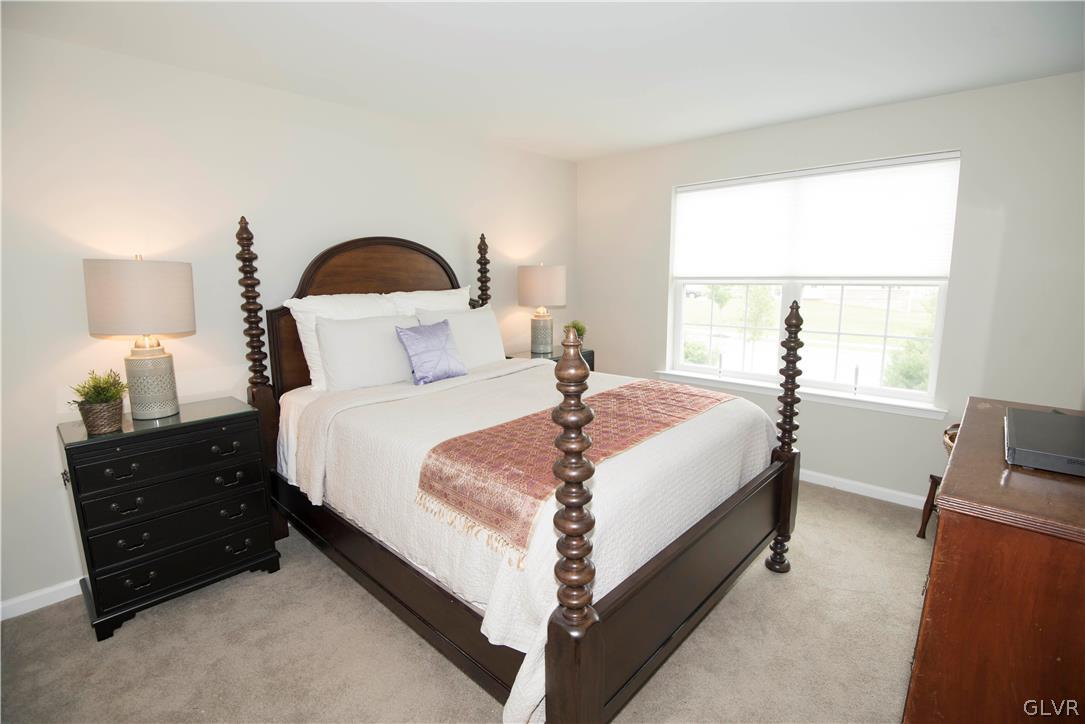 407 Pennycress Road Allentown, PA 18104 - Photo 19 of 34 a bed room with a bed and a window