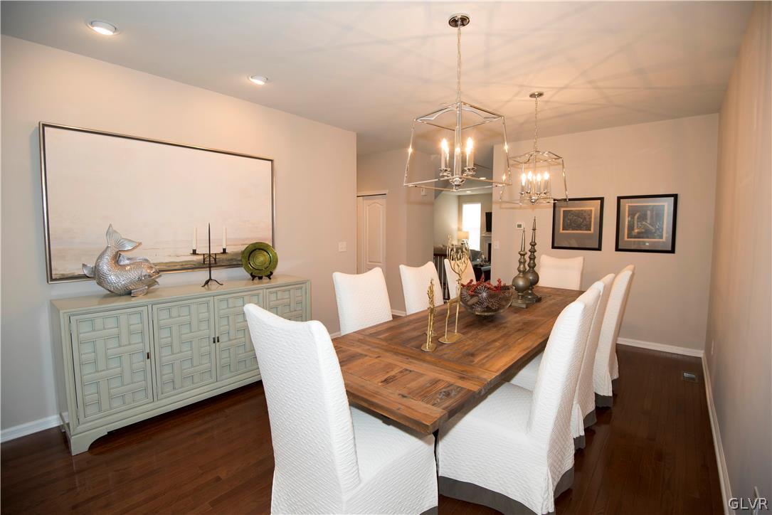 407 Pennycress Road Allentown, PA 18104 - Photo 2 of 34 a view of a dining room with furniture and wooden floor
