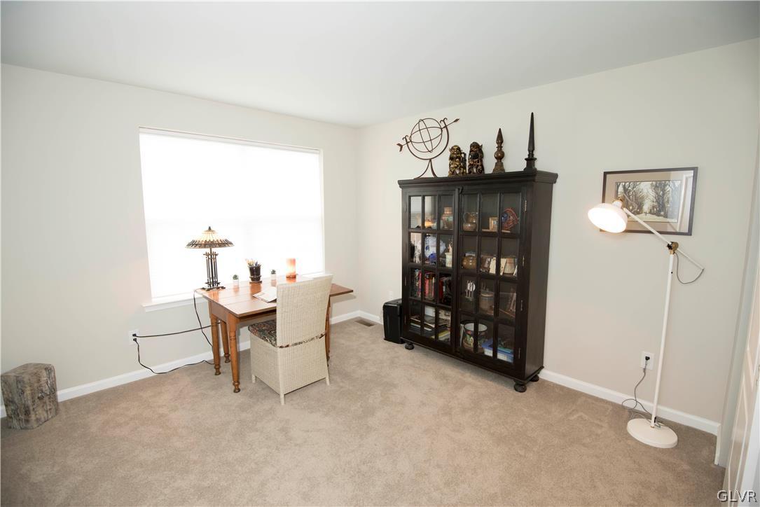 407 Pennycress Road Allentown, PA 18104 - Photo 21 of 34 a work room with furniture a rug and a window