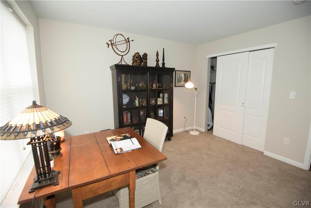 407 Pennycress Road Allentown, PA 18104 - Photo 22 of 34 a view of a room with furniture and chandelier