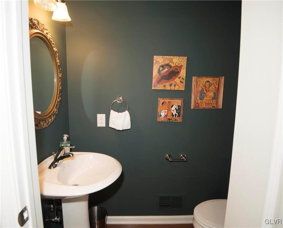 407 Pennycress Road Allentown, PA 18104 - Photo 26 of 34 a bathroom with a toilet sink and mirror