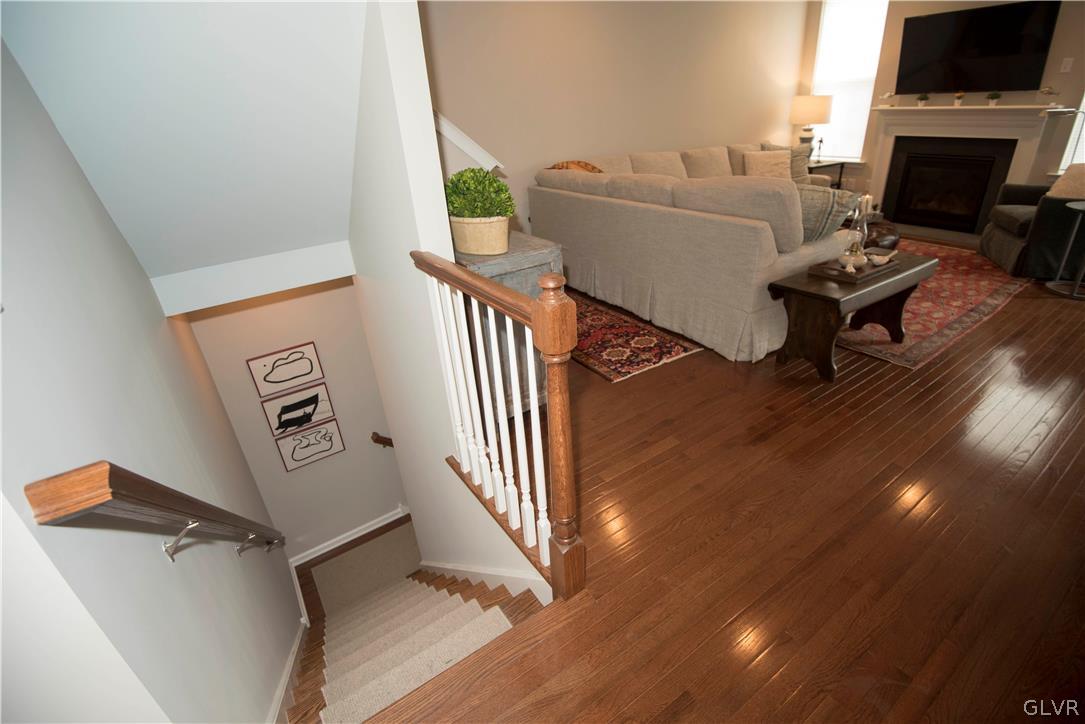 407 Pennycress Road Allentown, PA 18104 - Photo 27 of 34 a living room with furniture and a flat screen tv