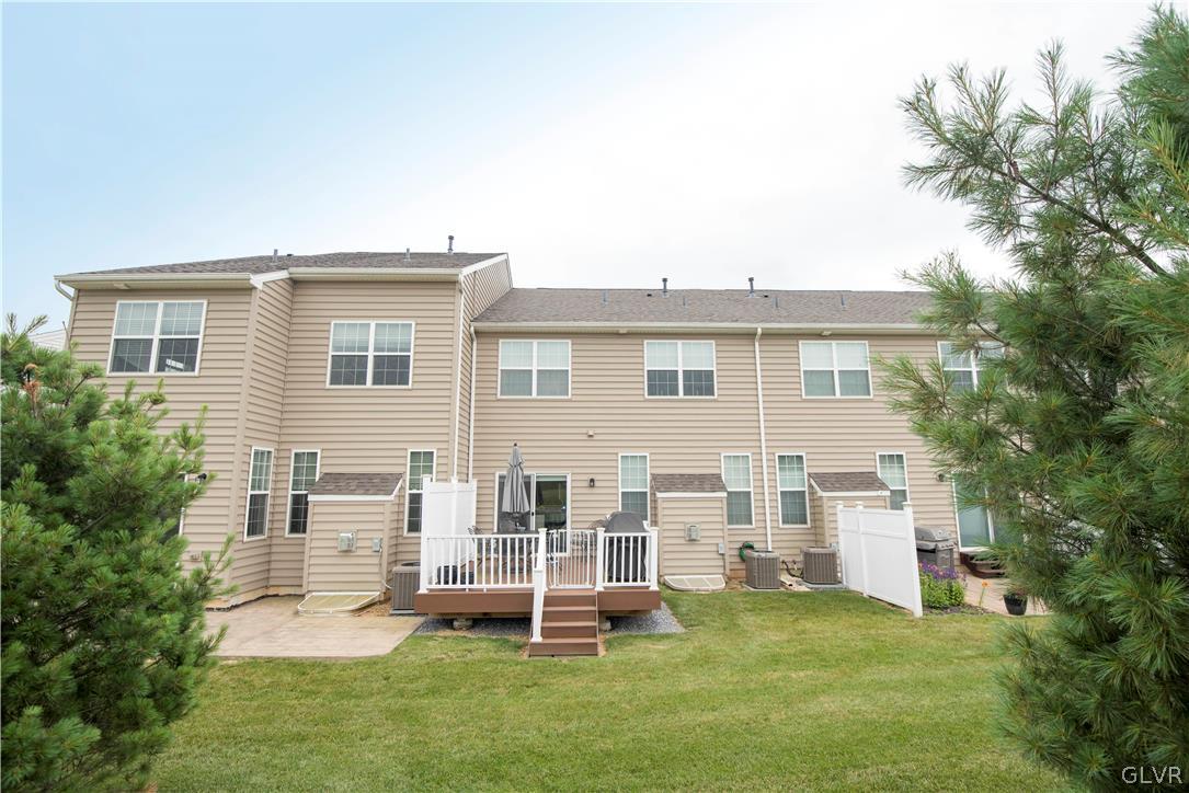 407 Pennycress Road Allentown, PA 18104 - Photo 33 of 34 a front view of a house with a yard and trees