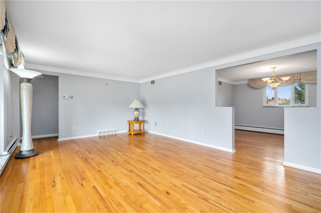 938 McCoy Road McKees Rocks, PA 15136 - Photo 4 of 24 a view of a livingroom with a staircase