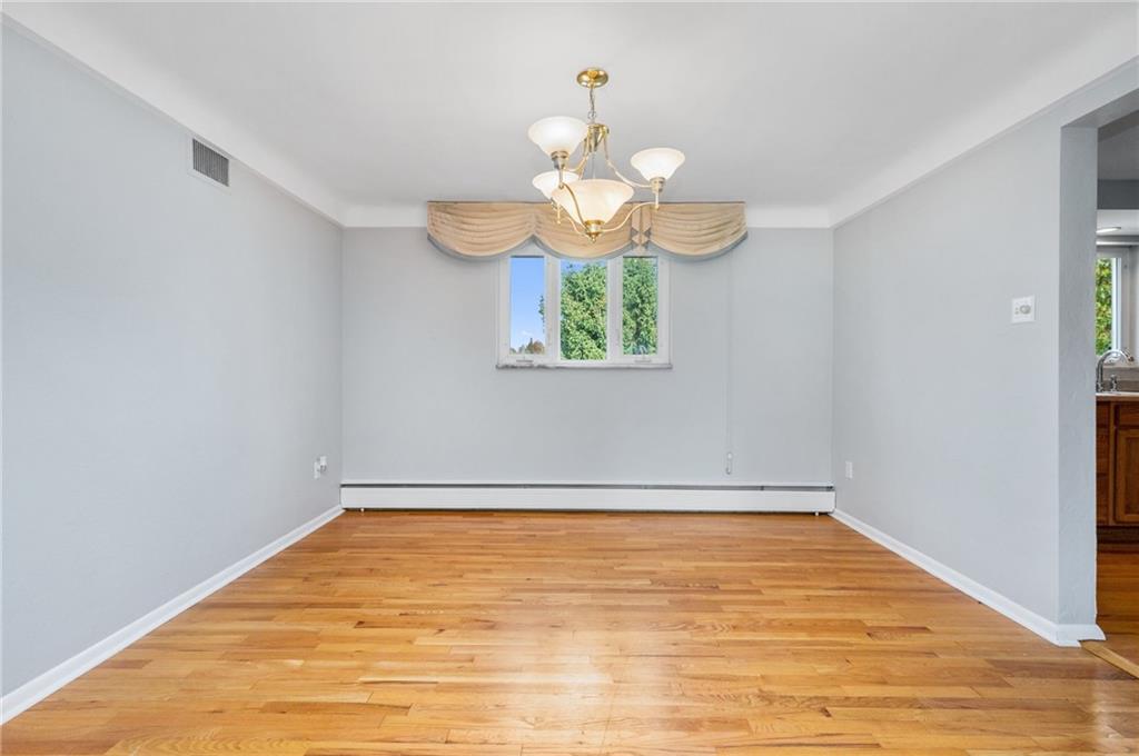 938 McCoy Road McKees Rocks, PA 15136 - Photo 6 of 24 a view of wooden floor in an empty room