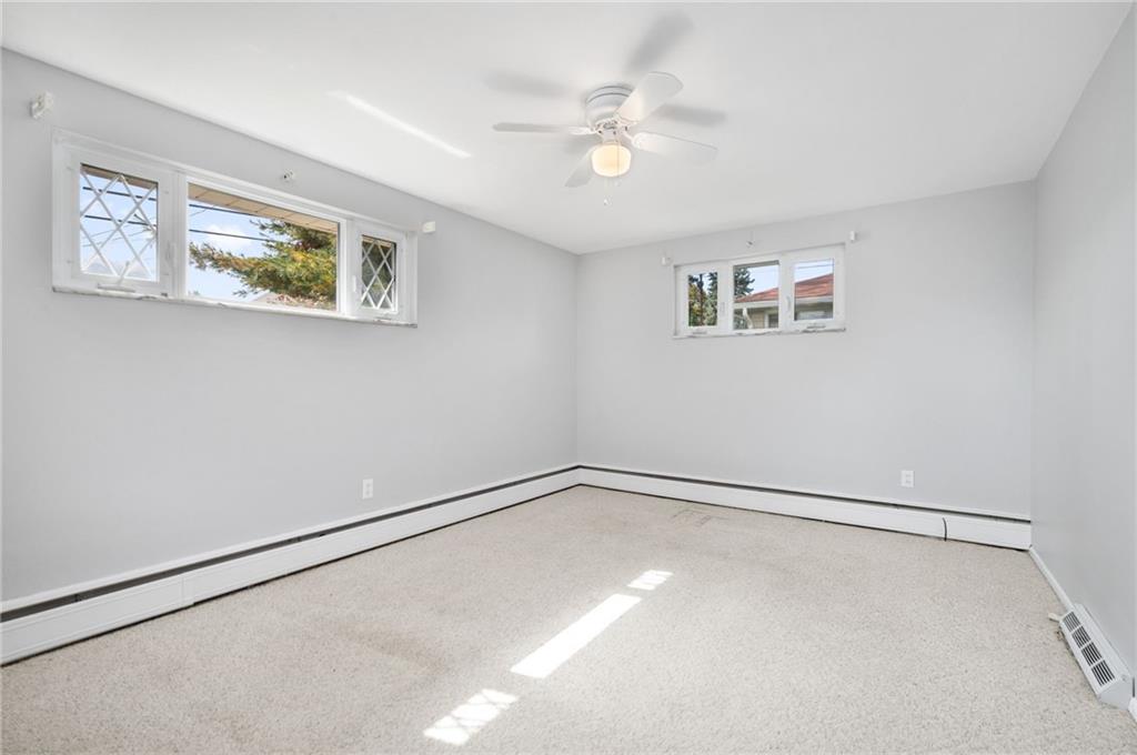 938 McCoy Road McKees Rocks, PA 15136 - Photo 9 of 24 a view of an empty room with a window