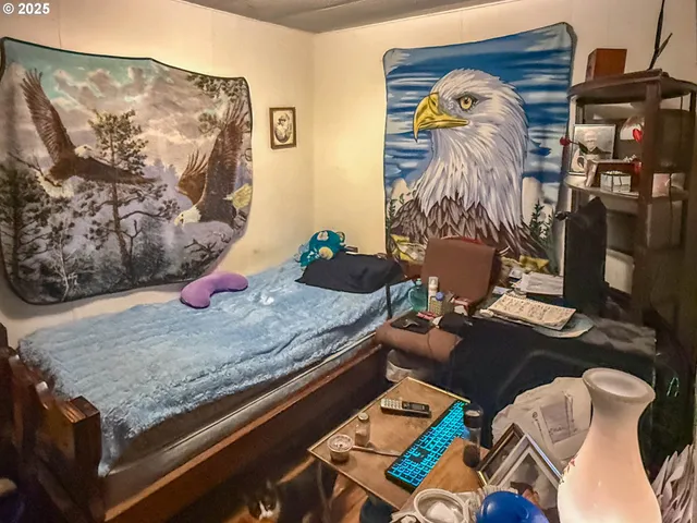 a living room with furniture and air hockey table