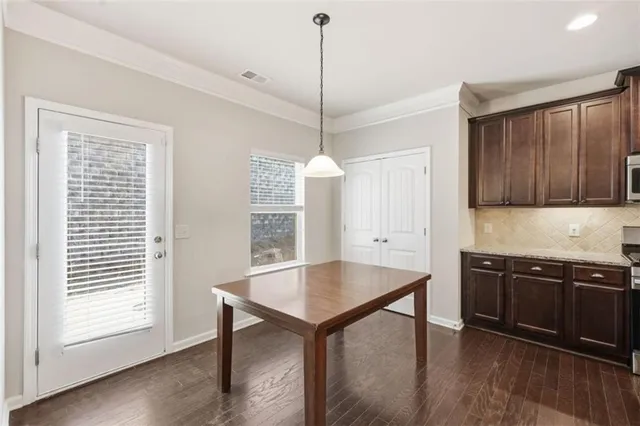 a bathroom with a shower and a sink
