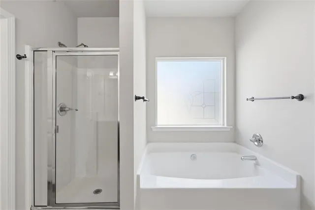 an empty room with a bathroom