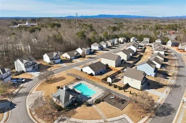 a view of a backyard with a patio