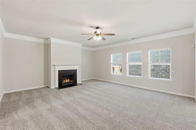 a balcony with furniture and a potted plant