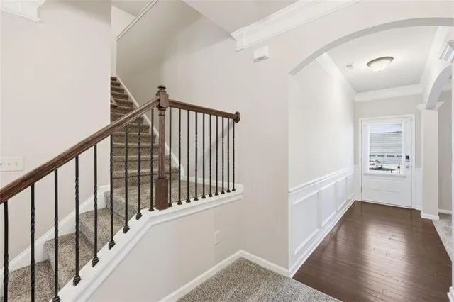 a view of an empty room with a fireplace