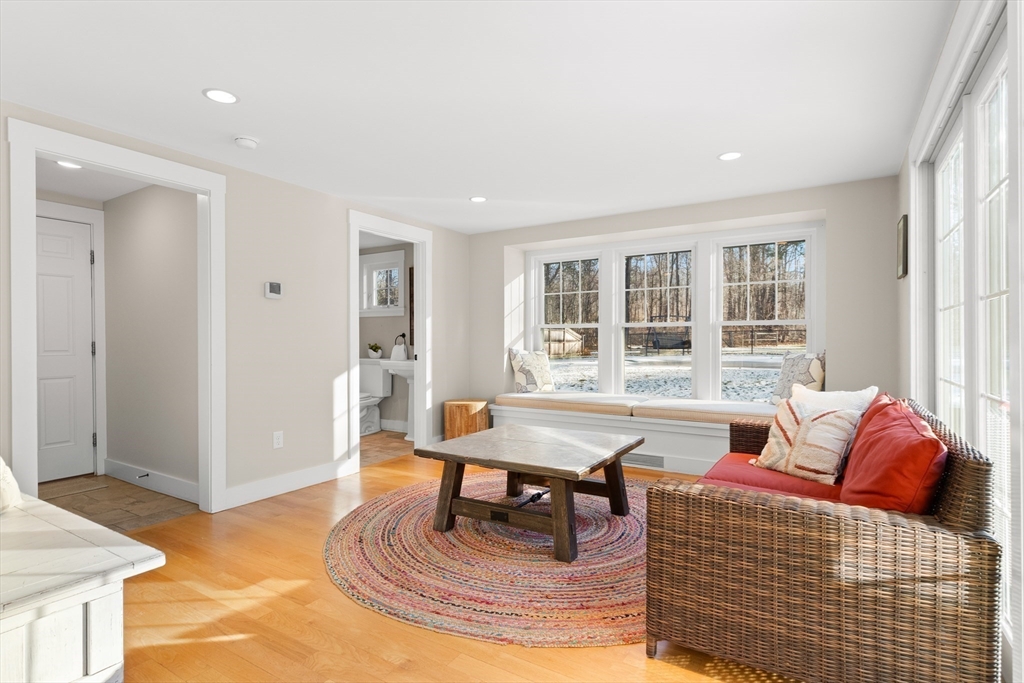 32 Alderbrook Drive Topsfield, MA 01983 - Photo 11 of 40 a living room with furniture and a window