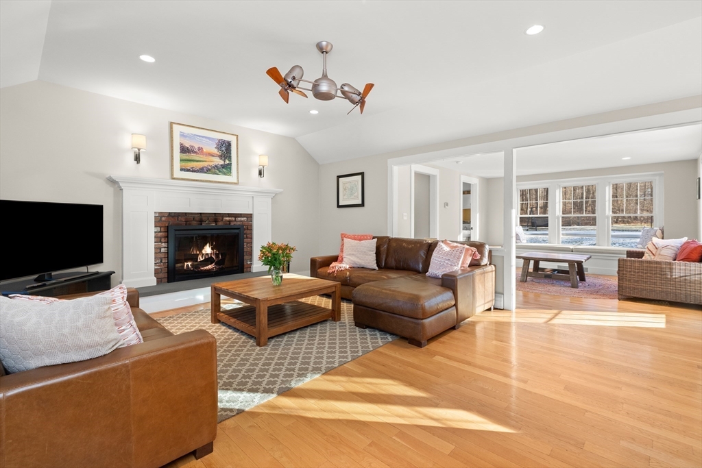 32 Alderbrook Drive Topsfield, MA 01983 - Photo 3 of 40 a living room with furniture and a fireplace