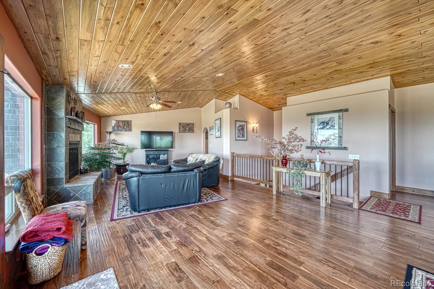 441 Kaufman Road Hartsel, CO 80449 - Photo 11 of 50 a living room with furniture and wooden floor