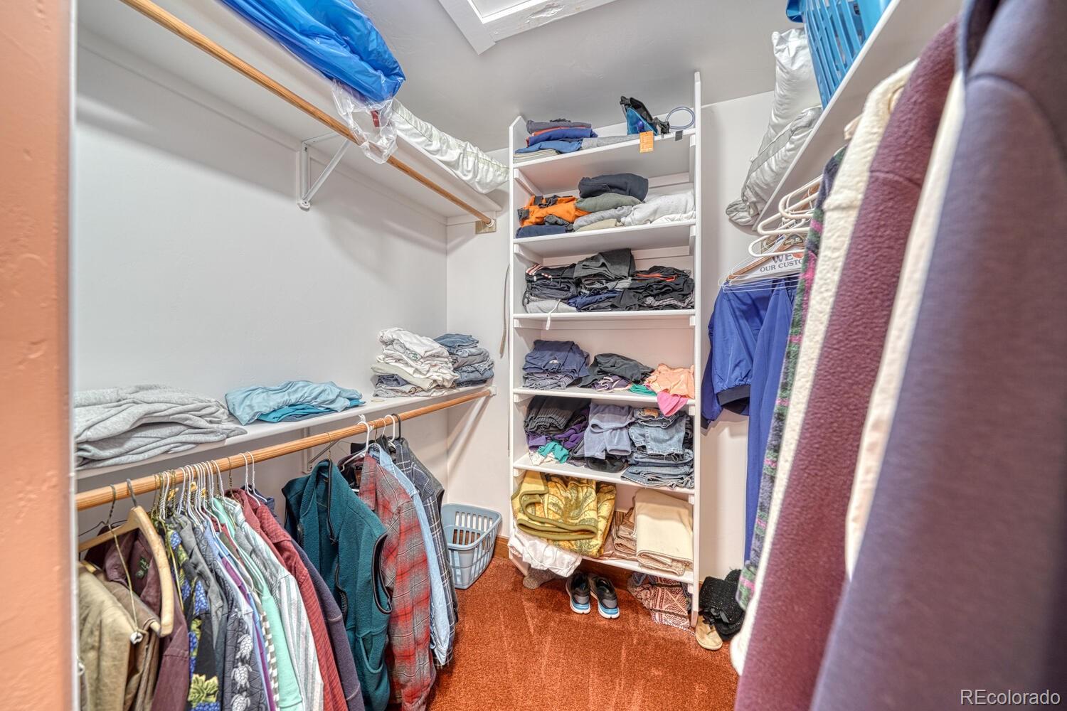 441 Kaufman Road Hartsel, CO 80449 - Photo 18 of 50 a view of walk in closet with clothes and shoes