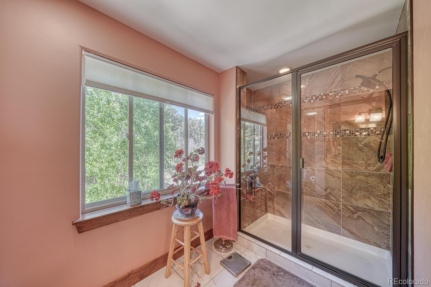 441 Kaufman Road Hartsel, CO 80449 - Photo 20 of 50 a very nice looking room with a large window and table