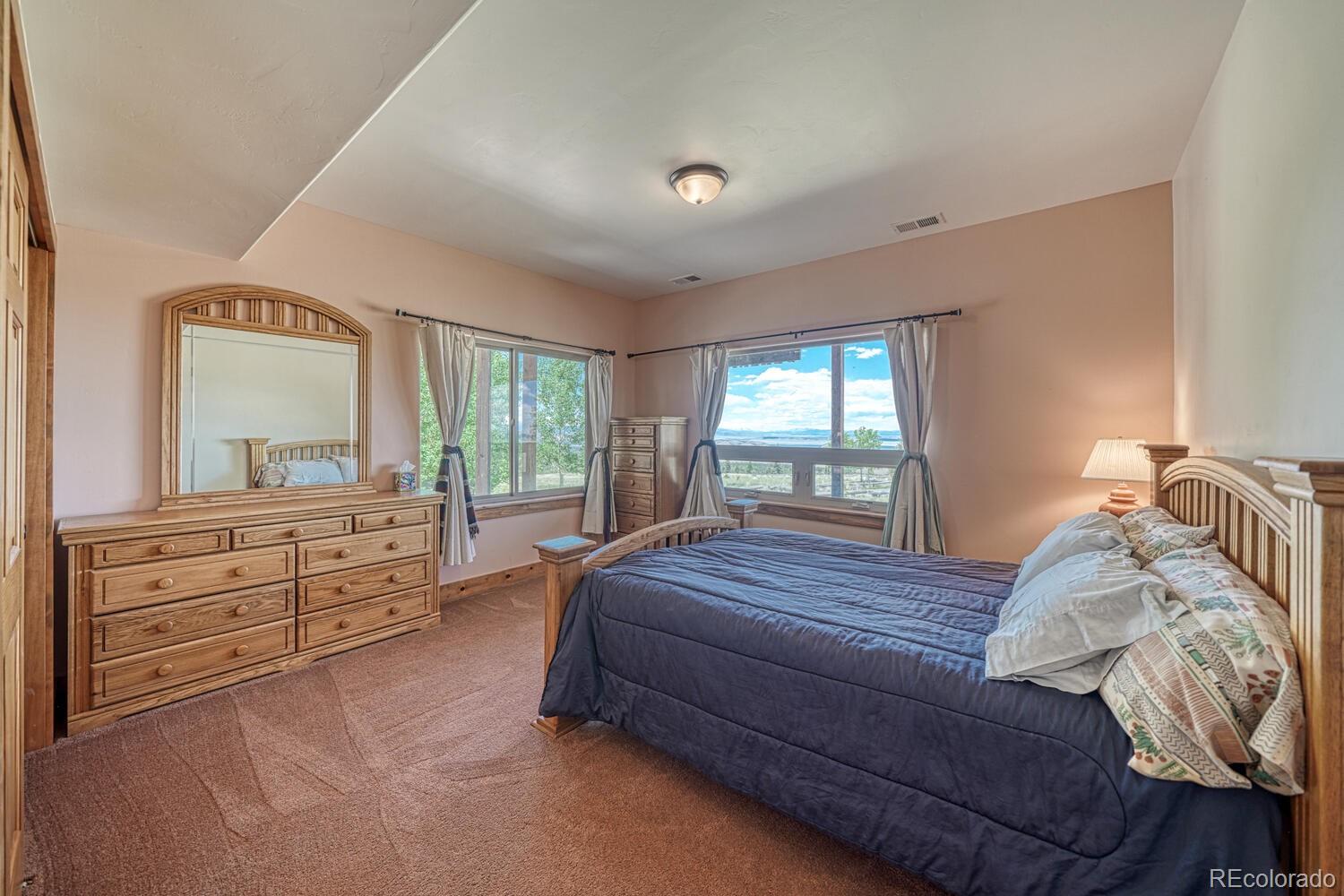 441 Kaufman Road Hartsel, CO 80449 - Photo 26 of 50 a bed room with a bed and a window