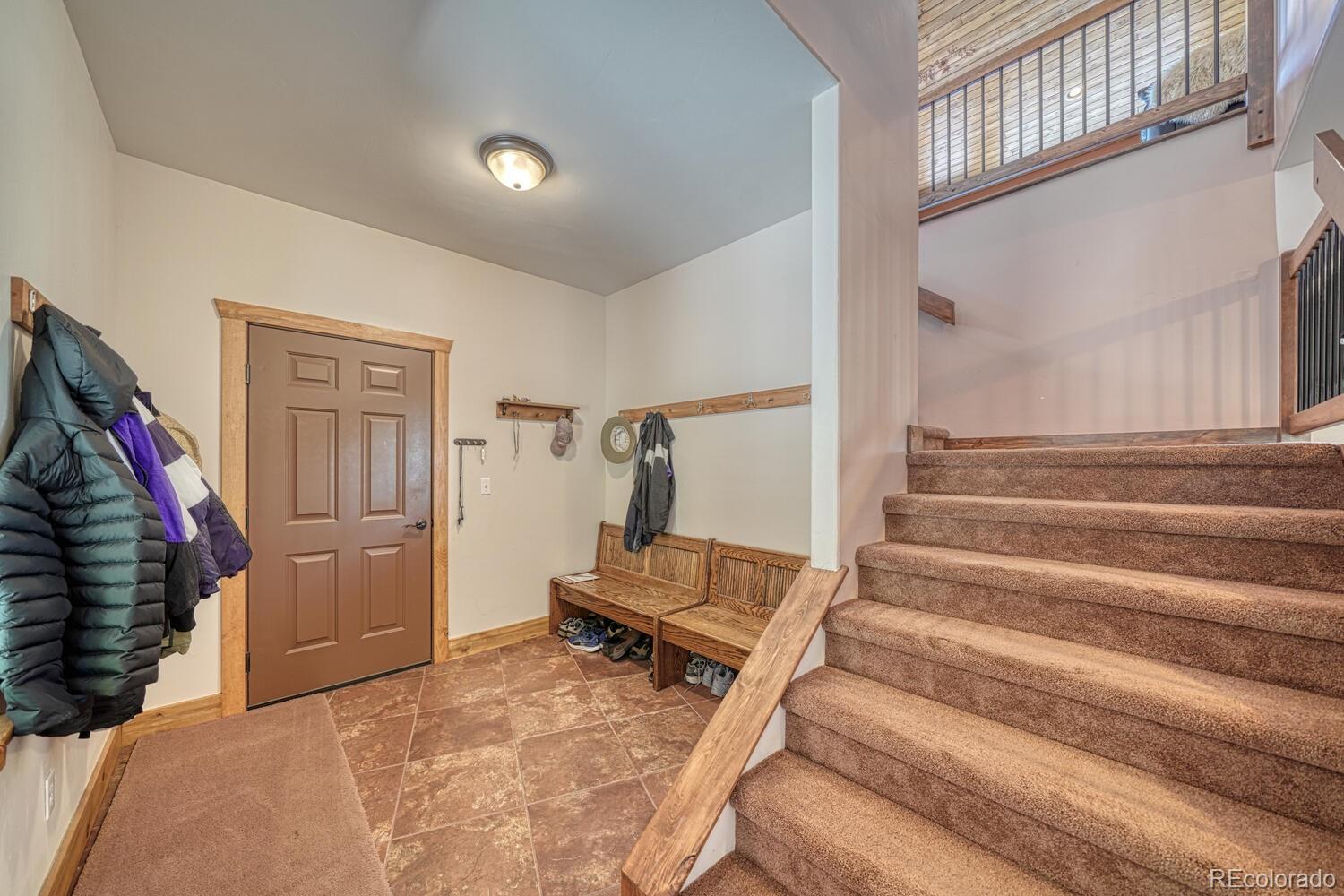 441 Kaufman Road Hartsel, CO 80449 - Photo 29 of 50 a view of a livingroom with furniture and stairs