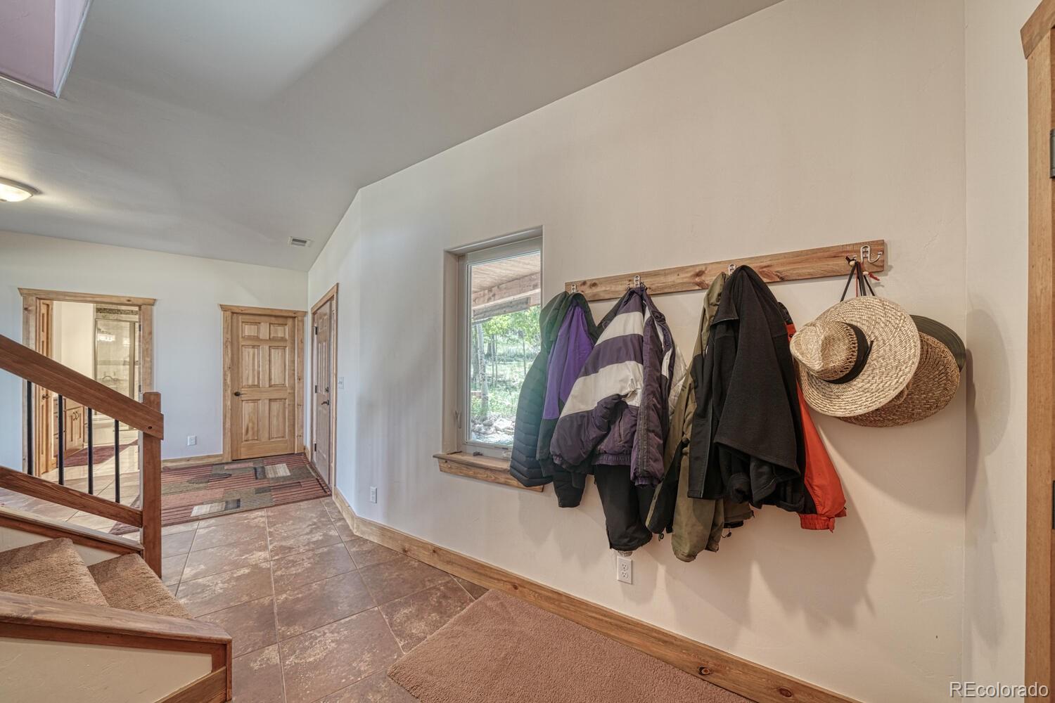 441 Kaufman Road Hartsel, CO 80449 - Photo 30 of 50 a view of walk in closet with clothes and shoes