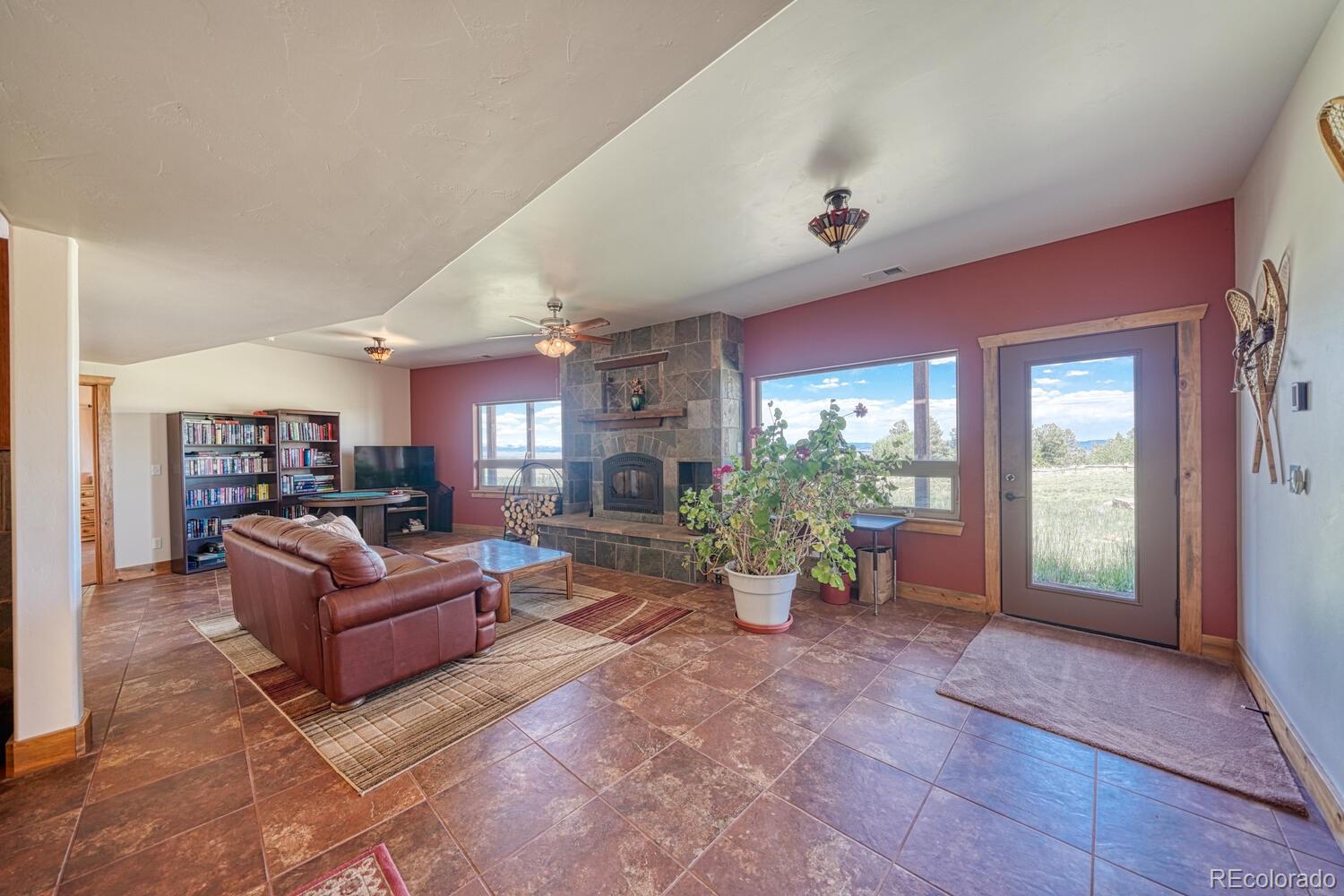441 Kaufman Road Hartsel, CO 80449 - Photo 34 of 50 a living room with furniture and a large window