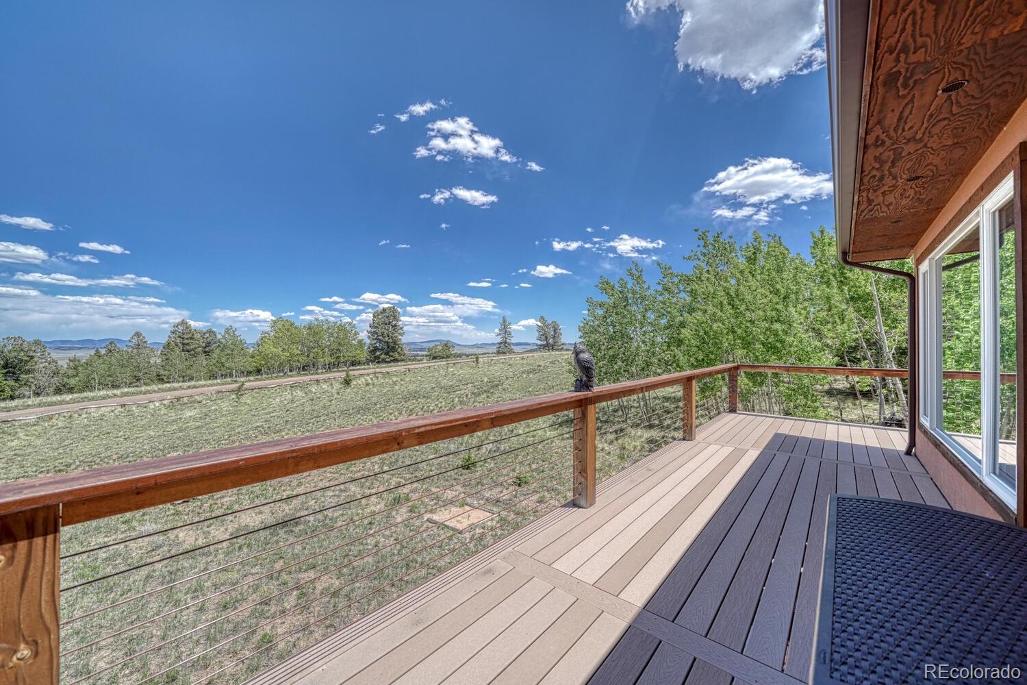 441 Kaufman Road Hartsel, CO 80449 - Photo 42 of 50 a view of house with yard and outdoor space