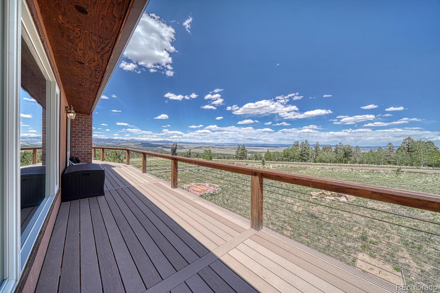 441 Kaufman Road Hartsel, CO 80449 - Photo 44 of 50 a view of a balcony with wooden floor