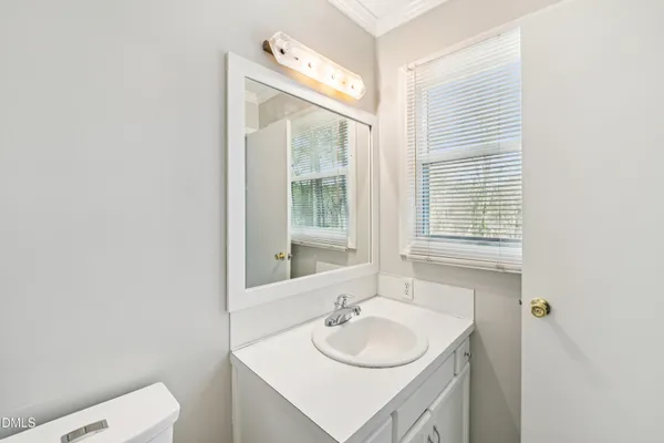 a bathroom with a shower curtain a bathtub and a shower