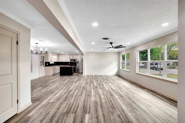 a view of kitchen with cabinets
