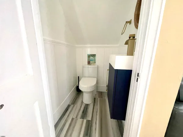 a bathroom with a sink and toilet
