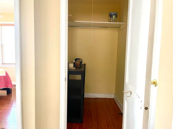 a view of walk in closet with rug