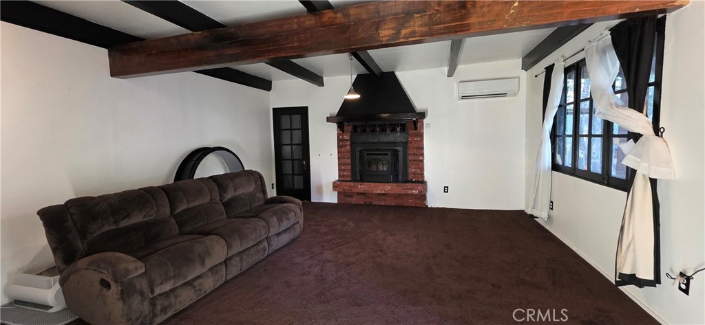 16455 French Town Road Brownsville, CA 95919 - Photo 7 of 26 a living room with furniture and a fireplace