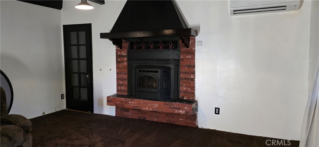 16455 French Town Road Brownsville, CA 95919 - Photo 8 of 26 a living room with furniture and a fireplace