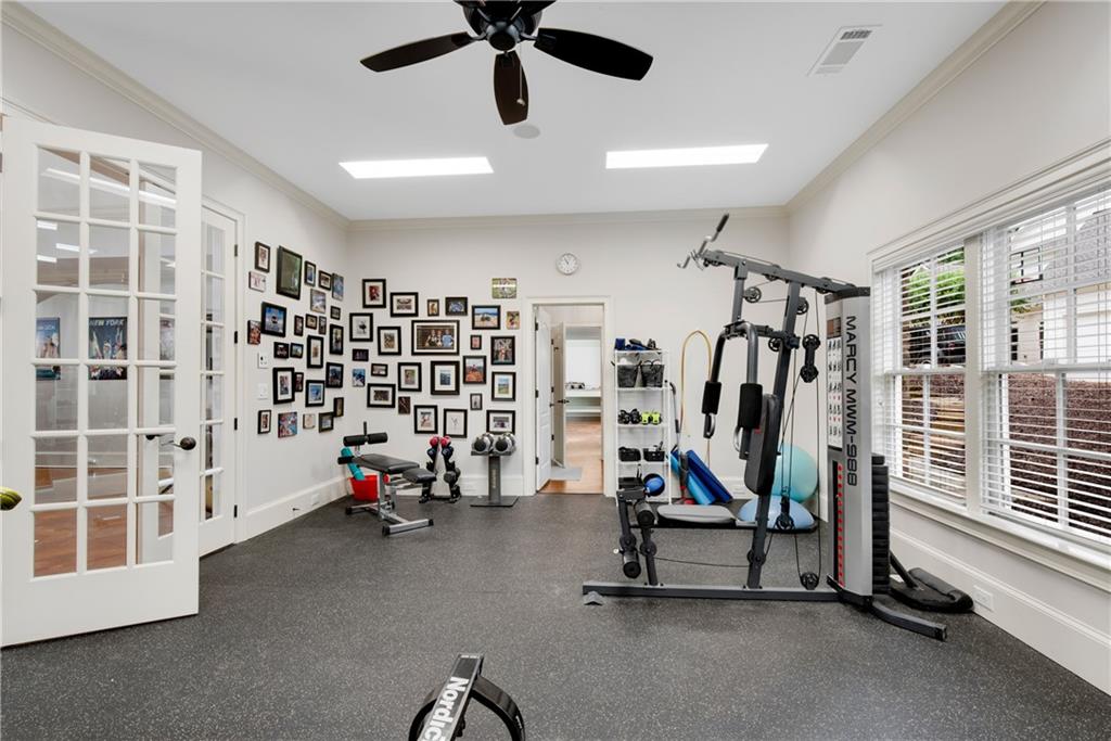 13942 Tree Loft Road Milton, GA 30004 - Photo 74 of 102 a view of a room with gym equipment