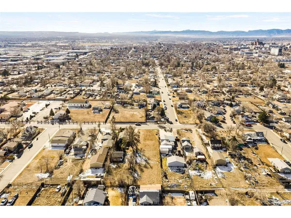 an aerial view of residential building with parking space