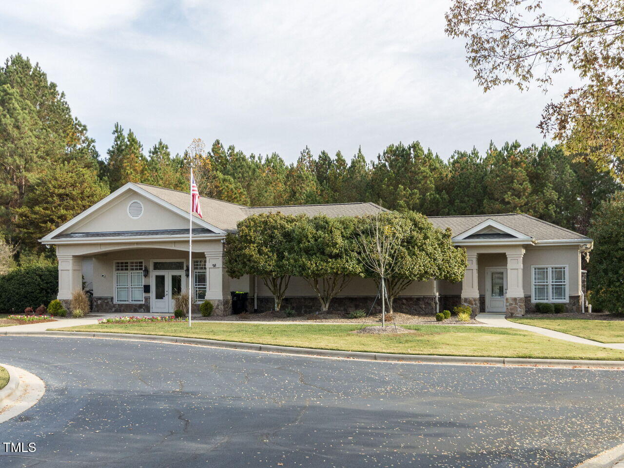 422 Colvard Woods Way Durham, NC 27713 - Photo 9 of 24 a front view of a house with a yard table and chairs