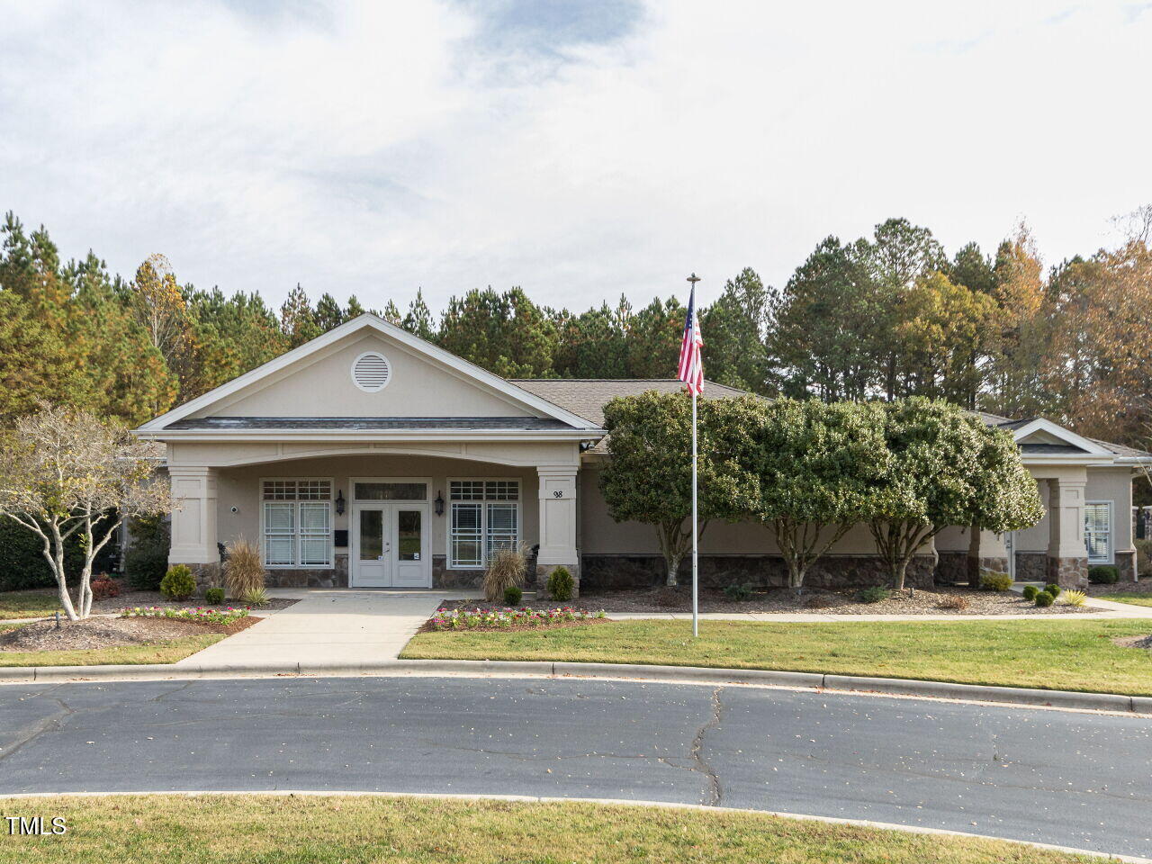 422 Colvard Woods Way Durham, NC 27713 - Photo 10 of 24 a view of a big house with a big yard and large trees